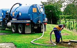 septic tank emptying cost ghana